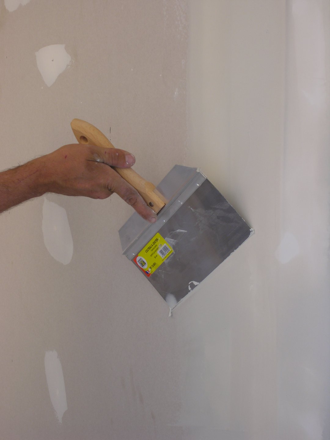 Couteau à enduire et à jointer les bandes 04